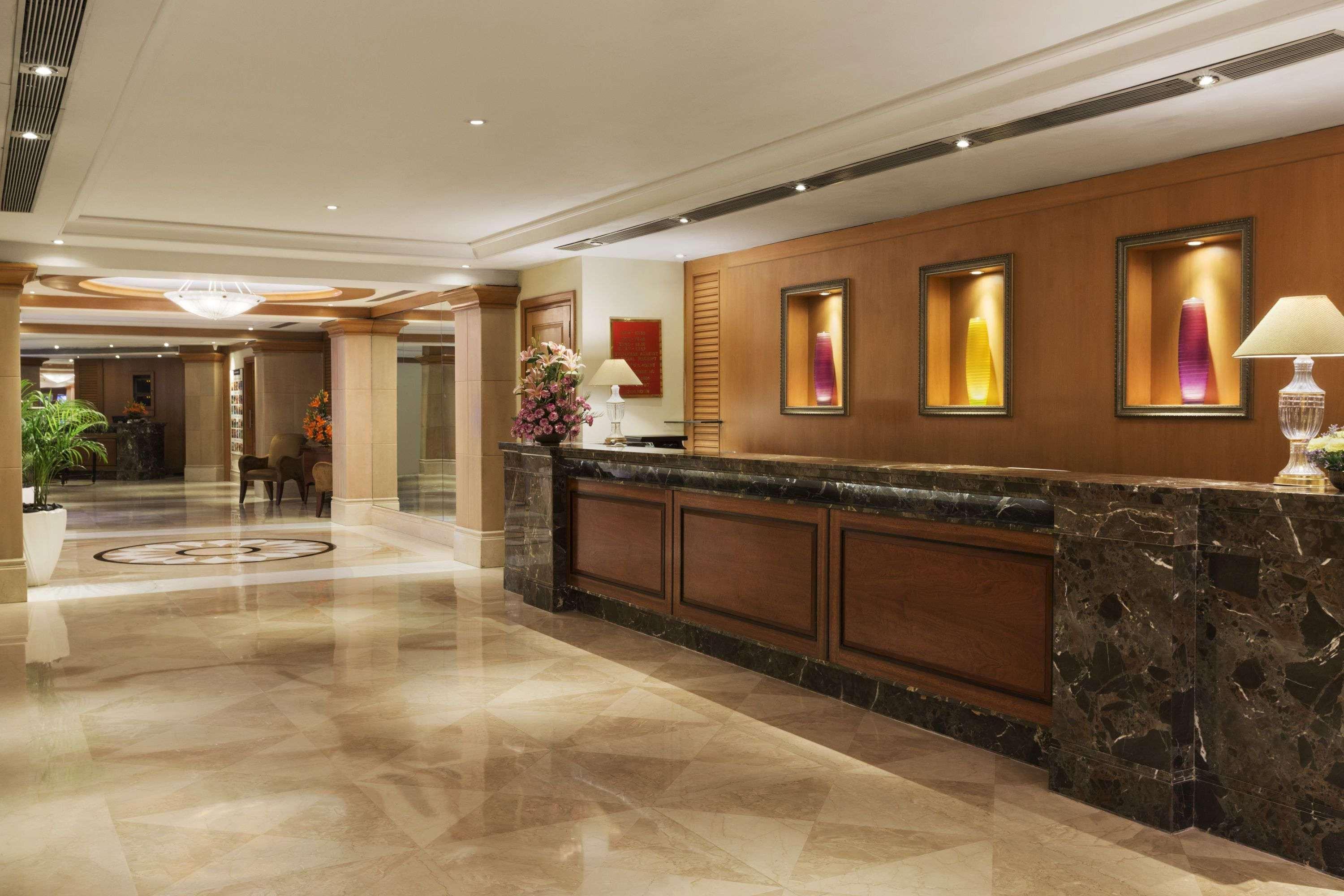 Ramada Plaza By Wyndham Palm Grove Hotell Mumbai Exteriör bild The lobby of the hotel