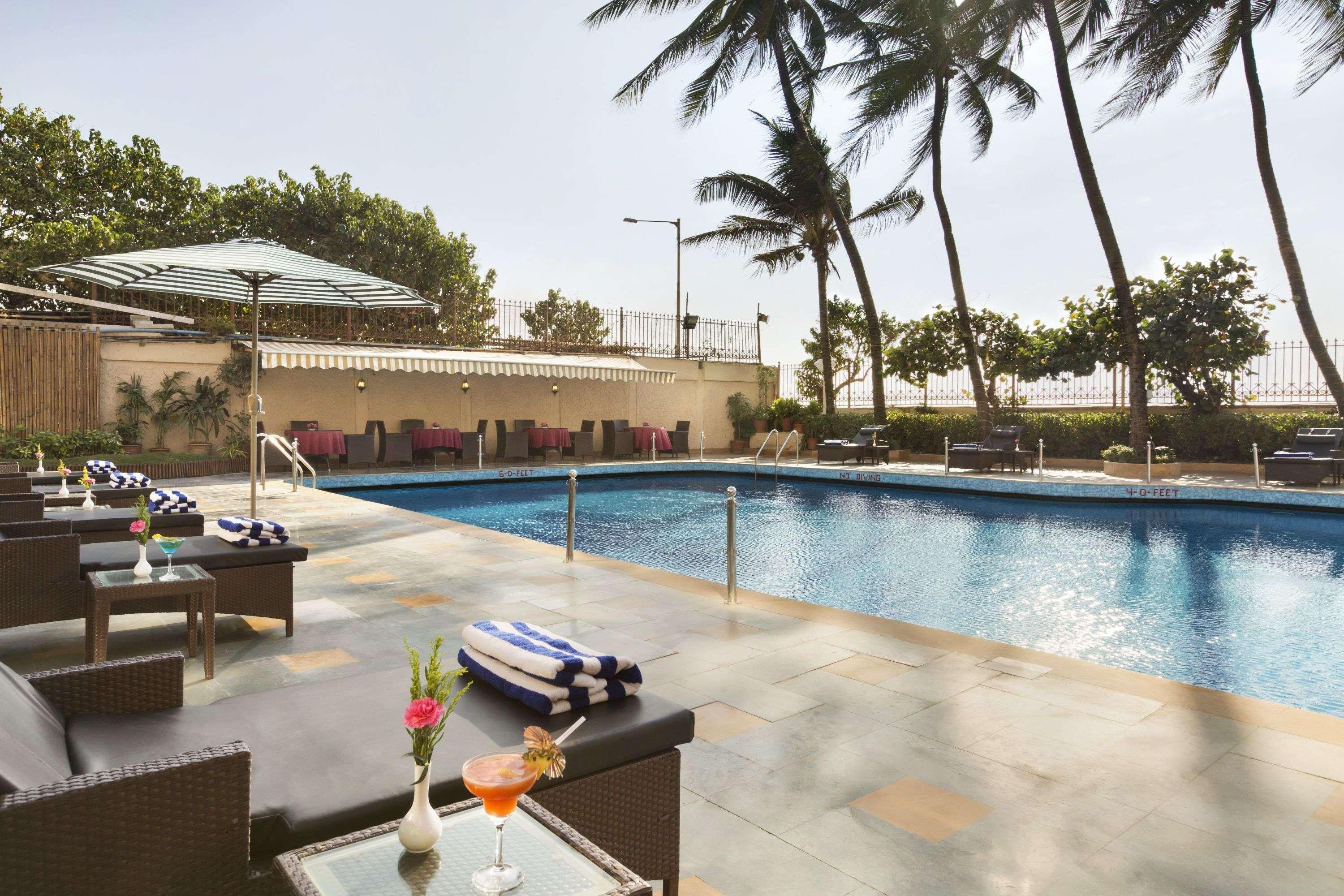 Ramada Plaza By Wyndham Palm Grove Hotell Mumbai Exteriör bild Pool at the Taj Mahal Palace