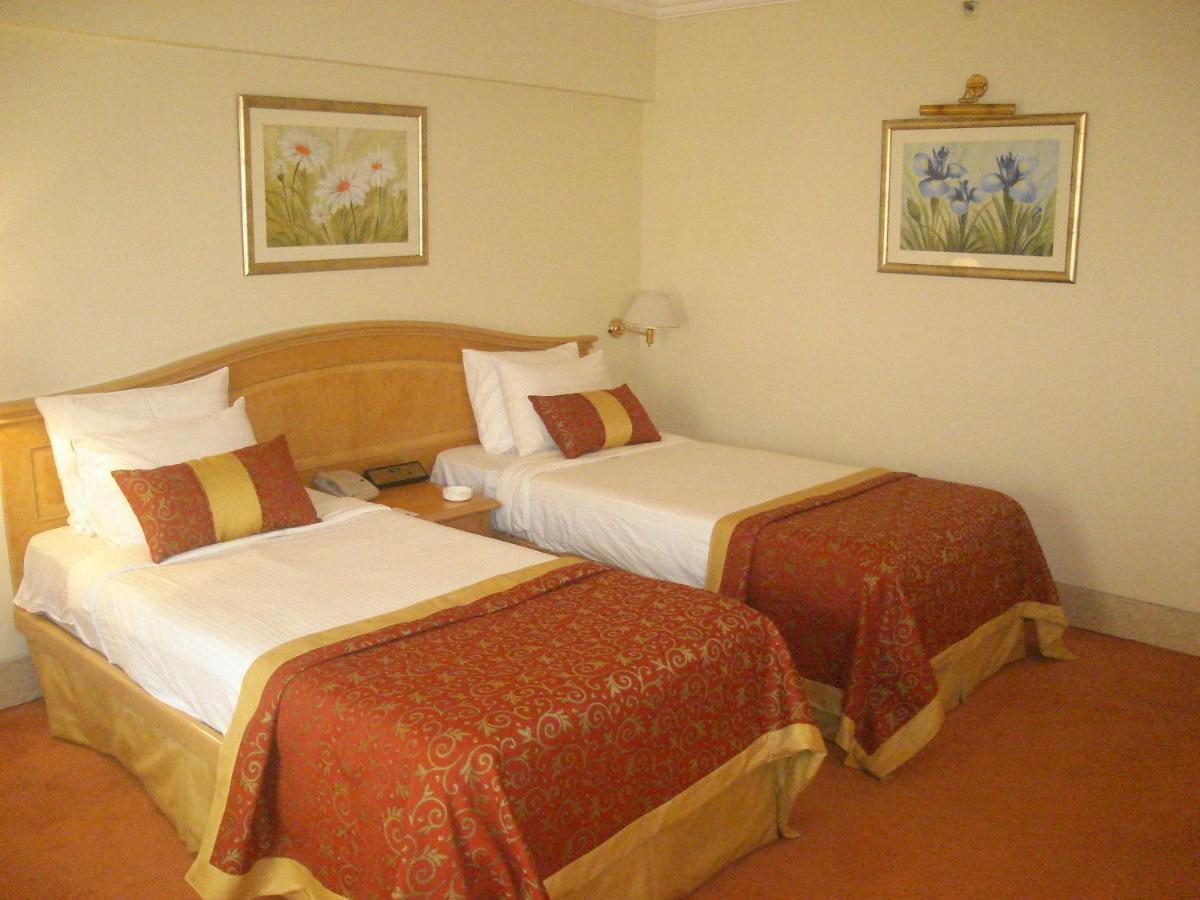 Ramada Plaza By Wyndham Palm Grove Hotell Mumbai Exteriör bild A room at the hotel